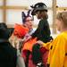 (left) Maureen McDonnell, Canton, shows rider Johanna Lautenbach, 5 of Ypsilanti, her candy bucket at the Harold and Kay Peplau Therapeutic Riding Center's Halloween Trick-or-Treat horse ride. (Tanya Moutzalias for AnnArbor.com)